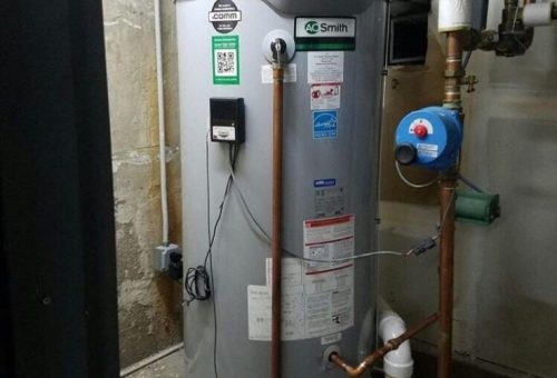 Professional water heater installation with A.O. Smith unit