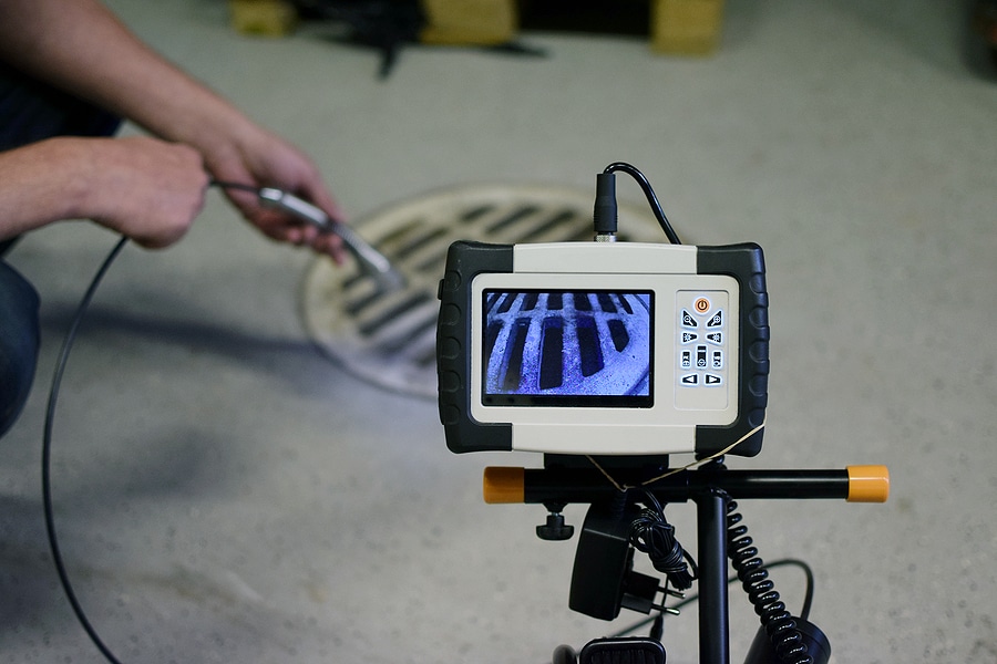 Professional pipe inspection camera equipment showing interior pipe view